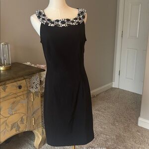 Elegant Black Dress with Embellished Neckline